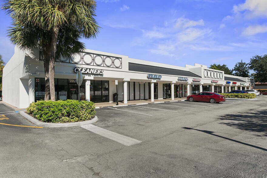 7495-7499 W Atlantic Ave, Delray Beach, FL à louer - Photo de l’immeuble – Image 2 sur 5