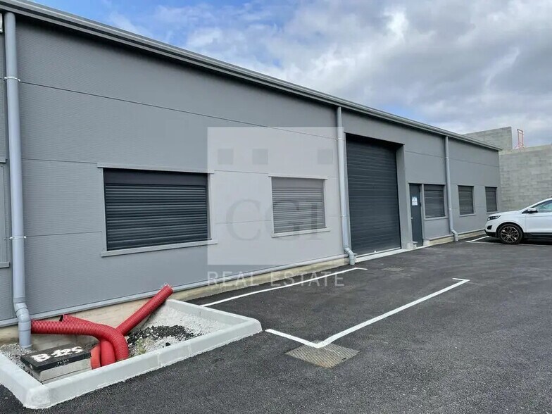 Local d’activités dans Le Pouzin à louer - Photo de l’immeuble – Image 1 sur 10