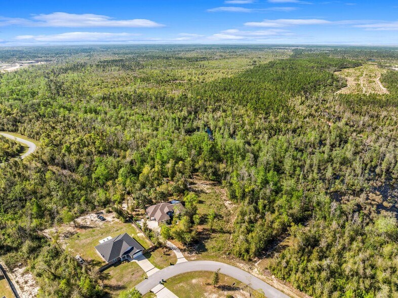 000 Cedar Creek Chase Drive, Southport, FL à vendre - Photo de l’immeuble – Image 2 sur 40