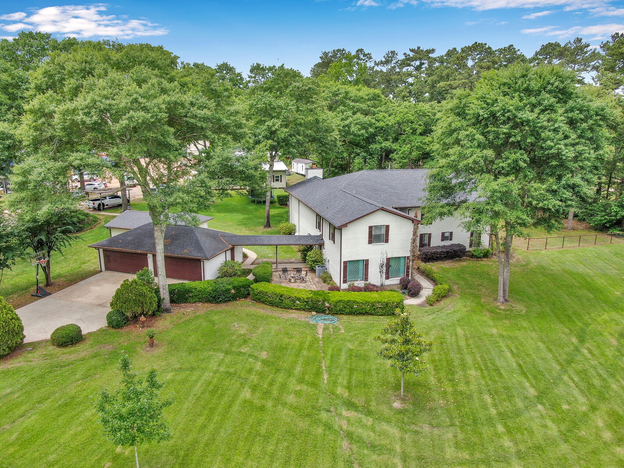 17691 Rogers Rd, New Waverly, TX à vendre Photo de l’immeuble– Image 1 sur 52