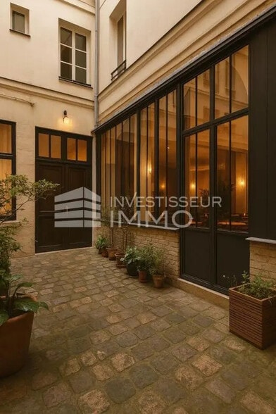 Local commercial dans Paris à vendre - Photo de l’immeuble – Image 1 sur 1