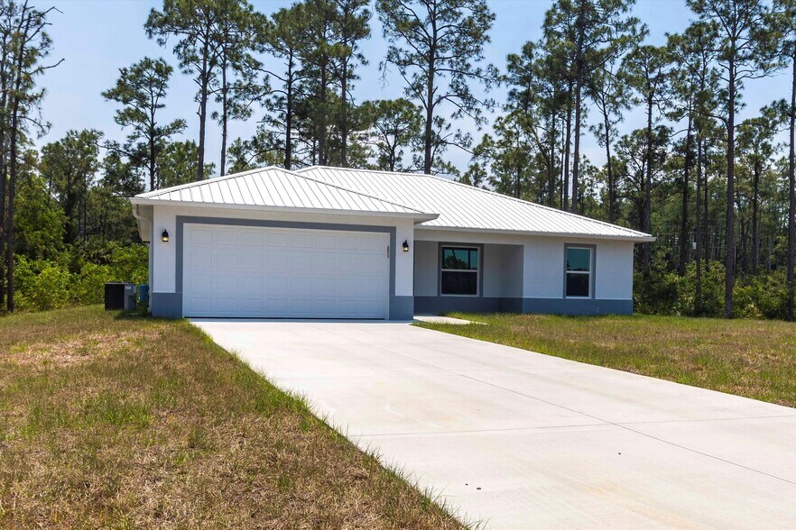 2009 Rosa Ct, Lehigh Acres, FL à vendre - Photo de l’immeuble – Image 2 sur 46